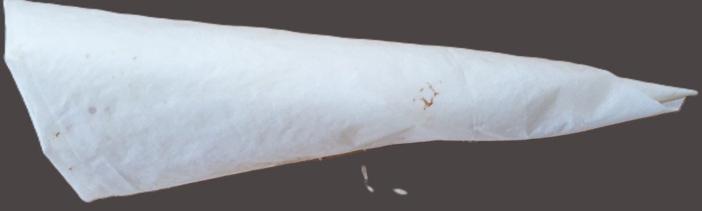 Cornetje vouwen van bakpapier.